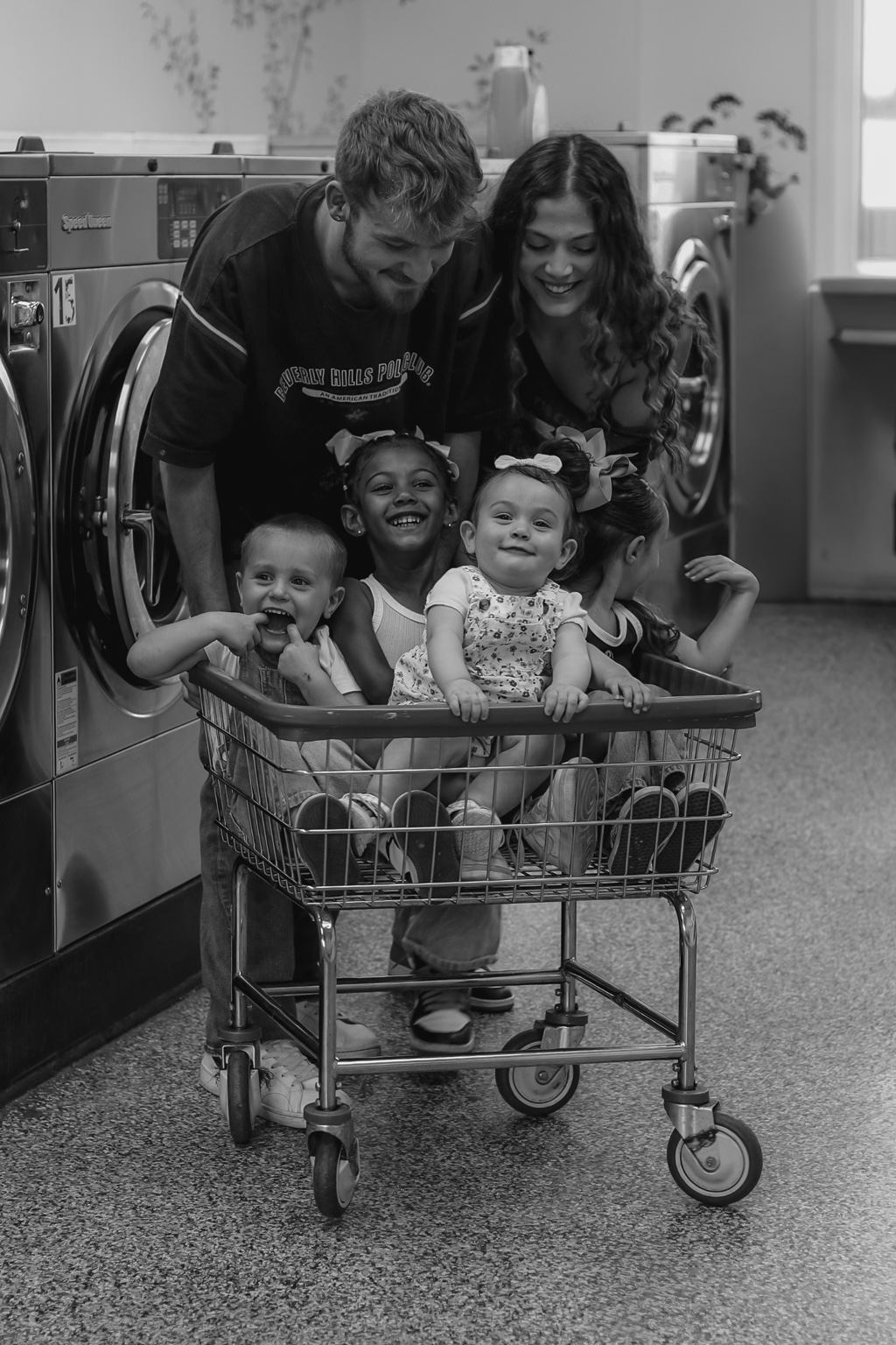 Kiley, Andrew, and the kids sharing a playful family moment